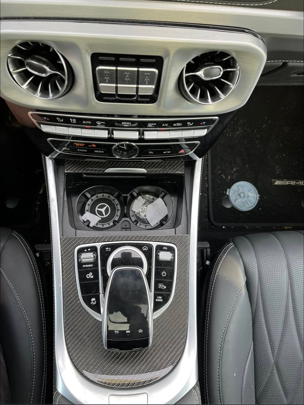 Detailed carbon-fiber center console of a Mercedes-Benz G-Wagon.